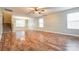 Spacious living room featuring hardwood floors, staircase, neutral paint and plenty of natural light at 1581 Arborgate Dr, Rock Hill, SC 29732