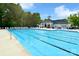 Inviting community pool with lap lanes and plenty of seating and a clubhouse at 16524 Kettlewell Ln, Charlotte, NC 28277