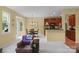 A dining area with a view of the kitchen is complemented by a door leading to the backyard at 16524 Kettlewell Ln, Charlotte, NC 28277