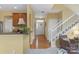Open entryway showcasing hardwood floors, a staircase, and seamless transition to other living spaces at 16524 Kettlewell Ln, Charlotte, NC 28277
