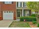 Inviting front porch with decorative wreath and well-maintained landscaping at 16524 Kettlewell Ln, Charlotte, NC 28277