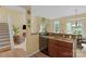 The kitchen area overlooks the dining and living area, providing a seamless transition for modern living at 16524 Kettlewell Ln, Charlotte, NC 28277