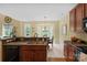 Modern kitchen area with a bar overlooking the dining and living area, perfect for entertaining and Gathering gatherings at 16524 Kettlewell Ln, Charlotte, NC 28277