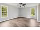Bright bedroom with two large windows overlooking the outdoors at 1676 Starmount Cir, Lancaster, SC 29720