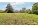 Quaint home nestled on a expansive lot with mature trees and green space at 1676 Starmount Cir, Lancaster, SC 29720
