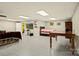 A finished basement provides space for a bedroom, entertainment area, and plenty of room for activities at 173 Chestnut Grove Rd, Statesville, NC 28625