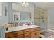 Bathroom featuring double vanity and a modern glass shower at 173 Chestnut Grove Rd, Statesville, NC 28625