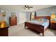 Bedroom features natural light, ceiling fan and wood furniture at 173 Chestnut Grove Rd, Statesville, NC 28625