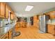 Spacious kitchen with custom oak cabinetry, granite countertops and stainless steel appliances at 173 Chestnut Grove Rd, Statesville, NC 28625