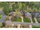 An aerial view of the property shows the home's roof, driveway, and landscaping at 18418 Turnberry Ct, Davidson, NC 28036