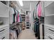 This closet has custom shelving and ample storage space for shoes, clothing, and accessories at 18418 Turnberry Ct, Davidson, NC 28036