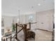 Open foyer showcases hardwood floors, a staircase, and a glimpse into the living room below at 18418 Turnberry Ct, Davidson, NC 28036