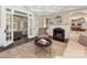 Bright living room with fireplace, white trim and view of adjacent room at 2030 Radcliffe Ave, Charlotte, NC 28207