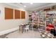 Vibrant playroom with built-in bookshelves, a gray patterned rug, and a comfortable seating area at 2030 Radcliffe Ave, Charlotte, NC 28207