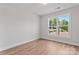 Bedroom with a view of trees through the window at 2032 Summey Ave, Charlotte, NC 28205