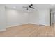 Large bedroom boasts recessed lighting, a ceiling fan, and neutral decor at 2032 Summey Ave, Charlotte, NC 28205