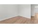 Simple bedroom with wooden flooring at 2032 Summey Ave, Charlotte, NC 28205