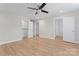 Spacious bedroom offers multiple closets and doorways, with natural light and modern ceiling fan at 2032 Summey Ave, Charlotte, NC 28205