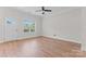 Living room with wood-look flooring and outdoor access at 2032 Summey Ave, Charlotte, NC 28205