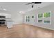 Bright living space with hardwood floors and windows overlooking the outdoor area at 2032 Summey Ave, Charlotte, NC 28205