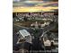 Aerial view of Locust Town Center showcasing community layout, commercial areas, and residential surroundings at 216 Harrison Ln # 4, Locust, NC 28097