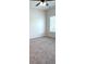 Cozy bedroom with neutral carpet, a ceiling fan, and a bright window at 216 Harrison Ln # 4, Locust, NC 28097