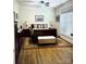 Relaxing bedroom with a comfortable bed, complemented by a patterned rug and natural light at 216 Harrison Ln # 4, Locust, NC 28097