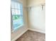 Closet with window and metal shelf with carpeting at 216 Harrison Ln # 4, Locust, NC 28097