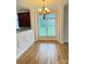 Dining area with wood floors and lots of windows at 216 Harrison Ln # 4, Locust, NC 28097