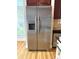 Stainless steel refrigerator and cabinets in this bright kitchen at 216 Harrison Ln # 4, Locust, NC 28097