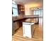 Bright kitchen with wood floors, cherry cabinets, stainless appliances and a center island at 216 Harrison Ln # 4, Locust, NC 28097