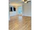 Open floor plan with wood floors, dining area and natural light at 216 Harrison Ln # 4, Locust, NC 28097