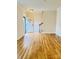 Bright living room featuring beautiful wood floors and neutral wall color perfect for any decor at 216 Harrison Ln # 4, Locust, NC 28097