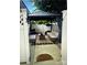 This home's exterior includes a covered patio with couch, table, and seating at 216 Harrison Ln # 4, Locust, NC 28097