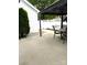 Outdoor patio with an outdoor eating space and white privacy fence at 216 Harrison Ln # 4, Locust, NC 28097