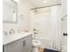 Bright bathroom with a tub and shower combo, modern vanity, and updated fixtures at 2313 Glenwood St, Kannapolis, NC 28083