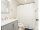 Beautiful bathroom featuring a shower-tub combo, vanity sink, and a decorative shower curtain at 2313 Glenwood St, Kannapolis, NC 28083