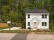Well-maintained home featuring pristine mulch and lush greenery that enhance the property's appeal and add to the curb appeal at 2313 Glenwood St, Kannapolis, NC 28083