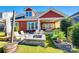 Spacious backyard with a fire pit, dining area, and lush landscaping. Great for entertaining! at 2329 Paddlers Cove Dr, Clover, SC 29710