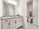 Bright bathroom featuring granite countertops, white cabinetry, and a separate toilet room, offering a clean design at 2329 Paddlers Cove Dr, Clover, SC 29710