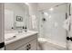 Modern bathroom with a white subway tile shower, a glass door, and a stylish vanity, creating a refreshing space at 2329 Paddlers Cove Dr, Clover, SC 29710