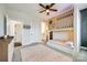 Chic bedroom with a unique bunk bed design, soft lighting, and a view into the ensuite bathroom at 2329 Paddlers Cove Dr, Clover, SC 29710
