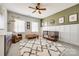 Charming Bedroom with board and batten, a crib, a leather chair, and a playful rug creating an inviting space at 2329 Paddlers Cove Dr, Clover, SC 29710
