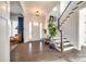 Inviting foyer with hardwood floors, a staircase, and a view of the living space at 2329 Paddlers Cove Dr, Clover, SC 29710