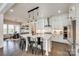 Modern kitchen featuring white cabinets, a large island, and stainless steel appliances at 2329 Paddlers Cove Dr, Clover, SC 29710