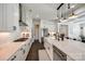 Stylish kitchen with white cabinets, a subway tile backsplash, and stainless steel appliances at 2329 Paddlers Cove Dr, Clover, SC 29710