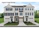 Charming townhome exterior with classic architectural details, manicured lawn and private garage for modern living at 2532 Ellen Ave # 1001F, Charlotte, NC 28208