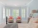 Inviting bedroom features a charming bay window area with comfortable seating at 2610 Creek Manor Dr, Waxhaw, NC 28173