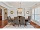 Dining room featuring an elegant light fixture, molding, and neutral colors at 2610 Creek Manor Dr, Waxhaw, NC 28173