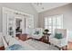 Cozy living room with white sofas, fireplace, and beautiful doorway at 2610 Creek Manor Dr, Waxhaw, NC 28173
